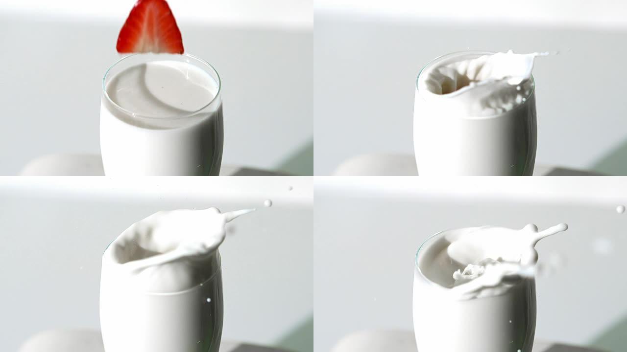 草莓掉进牛奶杯