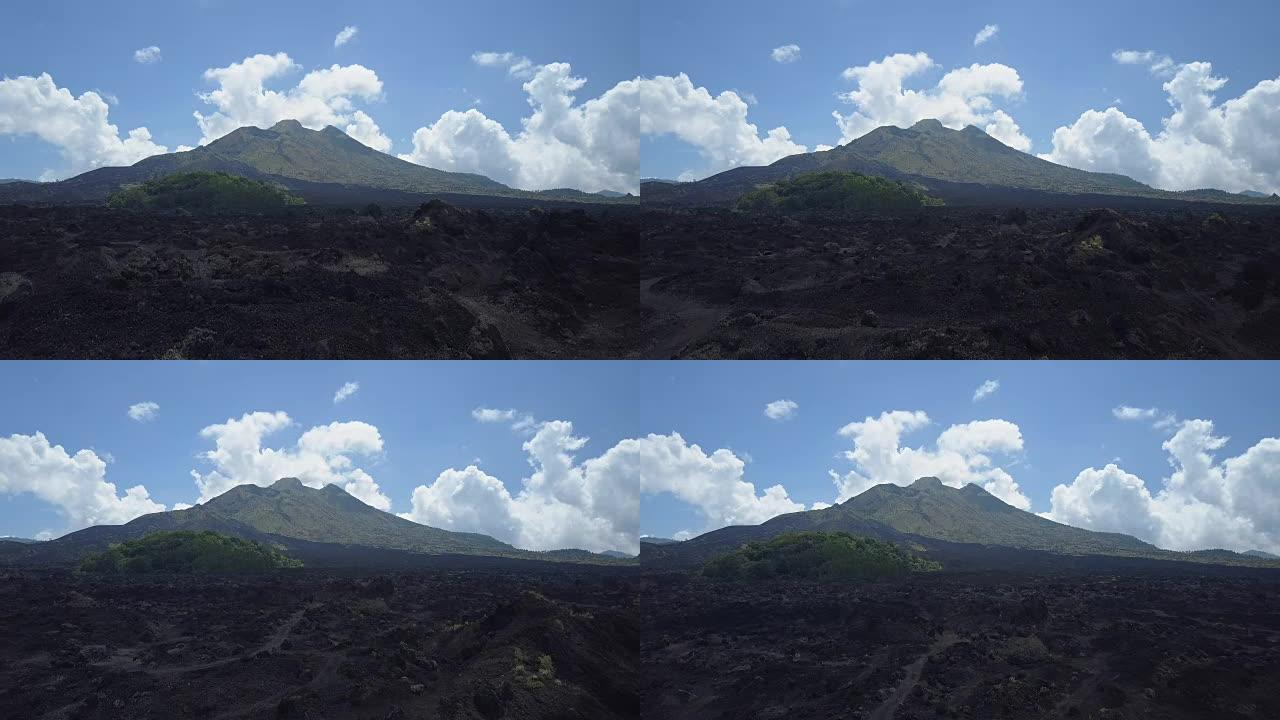 巴图尔火山山脚下的空中粗糙黑色熔岩岩地形