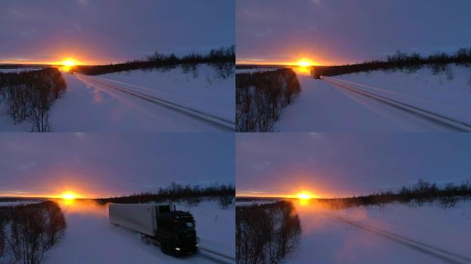 日落时，半卡车在积雪覆盖的公路槽森林景观上行驶