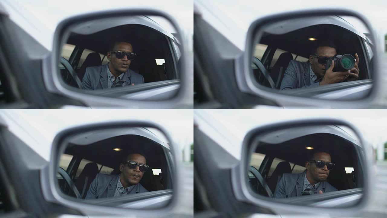 坐在车内用单反相机拍照的警察侧镜反射