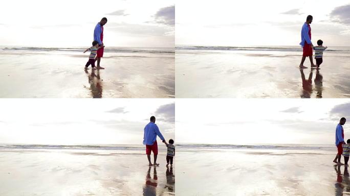 父子在沙滩上散步