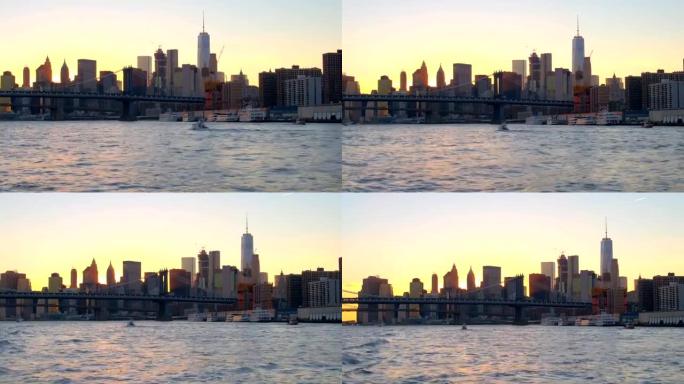 在东河上航行，观察曼哈顿天际线后面的金色太阳