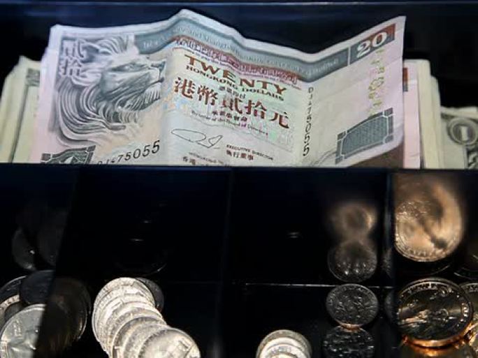 全球商业：美元取代香港货币