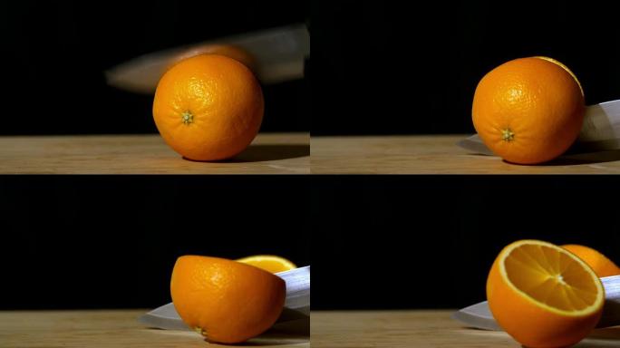 将橙色切成两半的刀