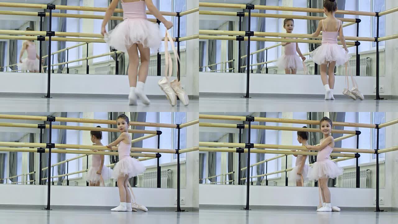 可爱的女孩开始芭蕾舞课