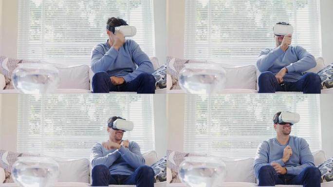 年轻人坐在沙发上体验虚拟现实耳机4K 4k