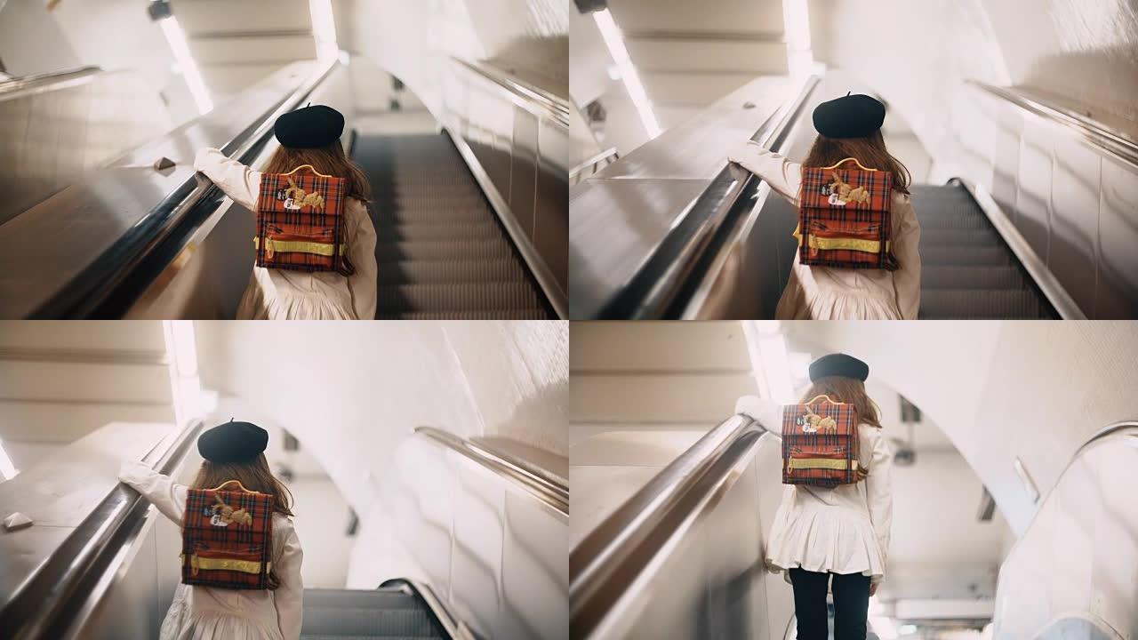 可爱的小女孩坐电梯上楼的后视图。孩子们穿法国风格的衣服去上学