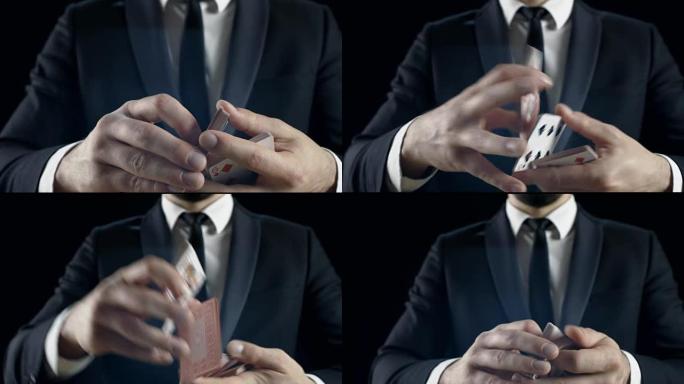一个合适的魔术师的手表演技巧的特写镜头。背景是黑色的。