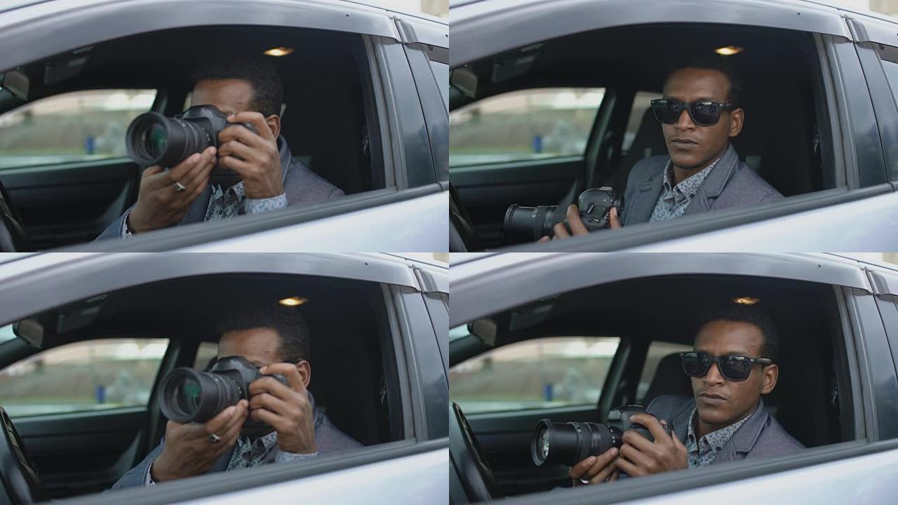 私人侦探男子坐在车内，用单反相机拍照