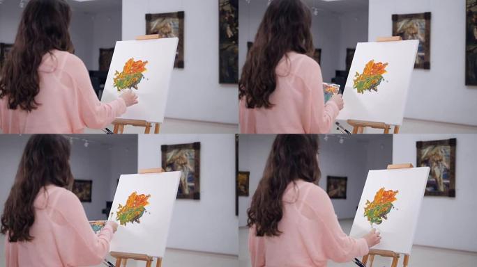 艺术家在画架上画画。4K。