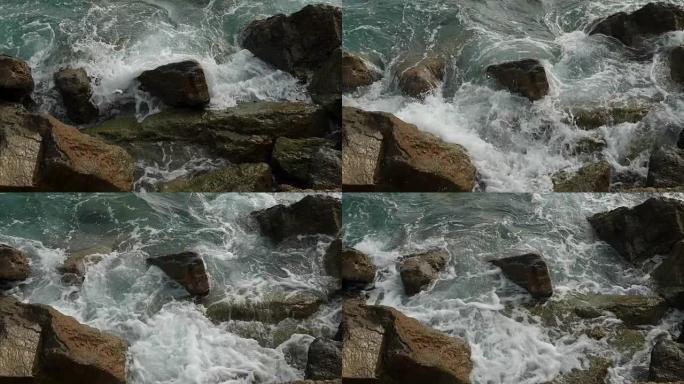 海浪撞击石滩-慢动作。