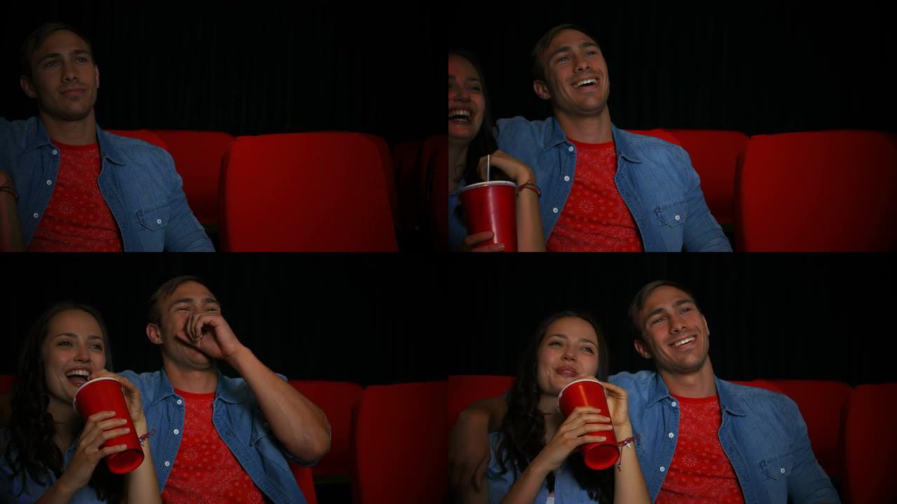 夫妇在电影院看电影