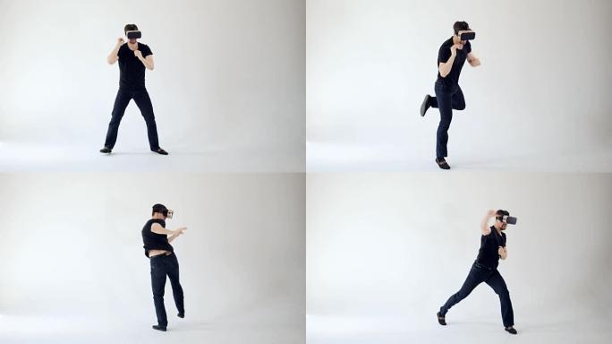 虚拟现实的概念。男人在VR耳机拳击。