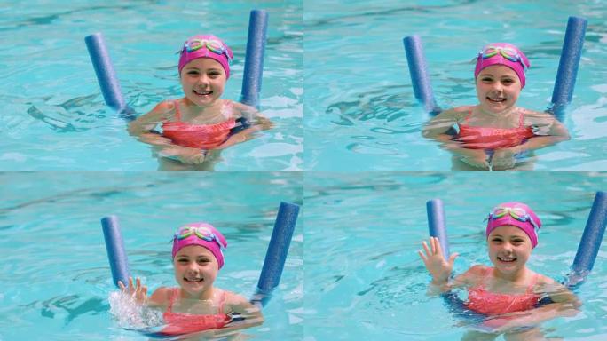 年轻女孩在游泳池里打手势的肖像