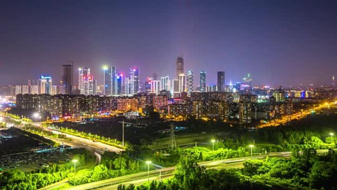 夜间临近河流的现代城市景观