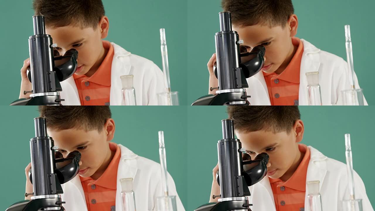一个小学生在实验室里通过显微镜看4k