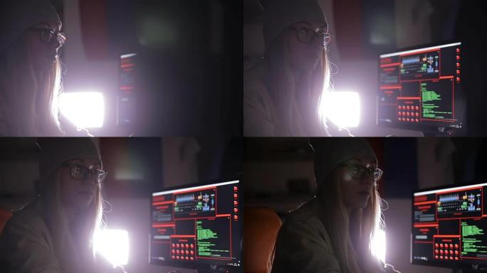 在电脑上工作的女黑客，夜间编码