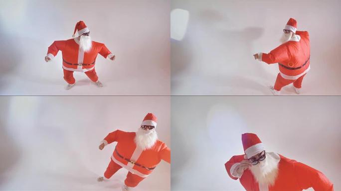 圣诞老人在白色背景上有趣地跳舞。4K。