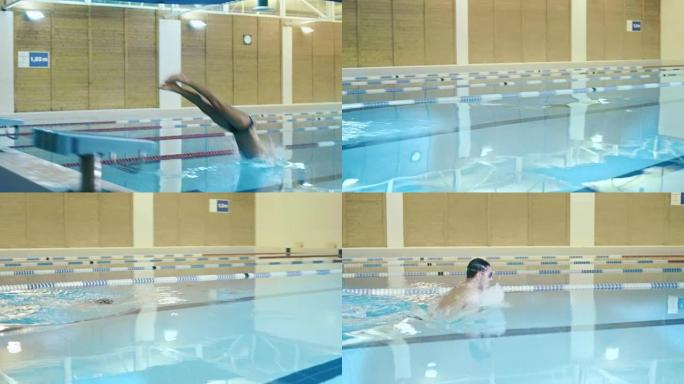 职业男子游泳运动员跳下起跑器并进行蝶泳。摄像机跟着他。