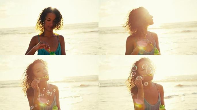 美丽的年轻女子在日落时在海滩上吹泡泡，柔和温暖的复古色调