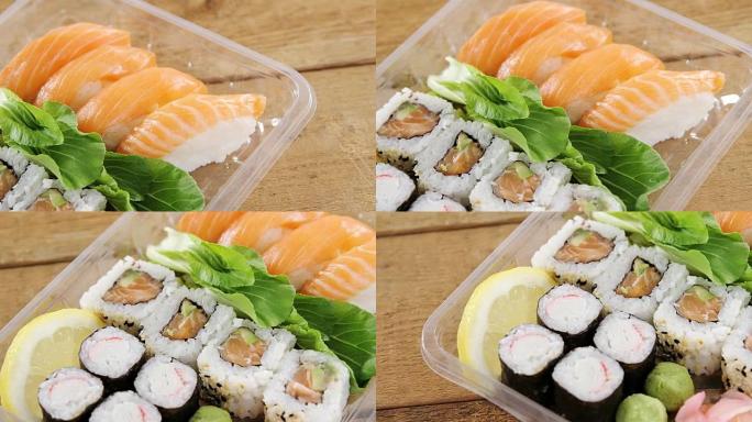 塑料容器中的鲑鱼寿司卷