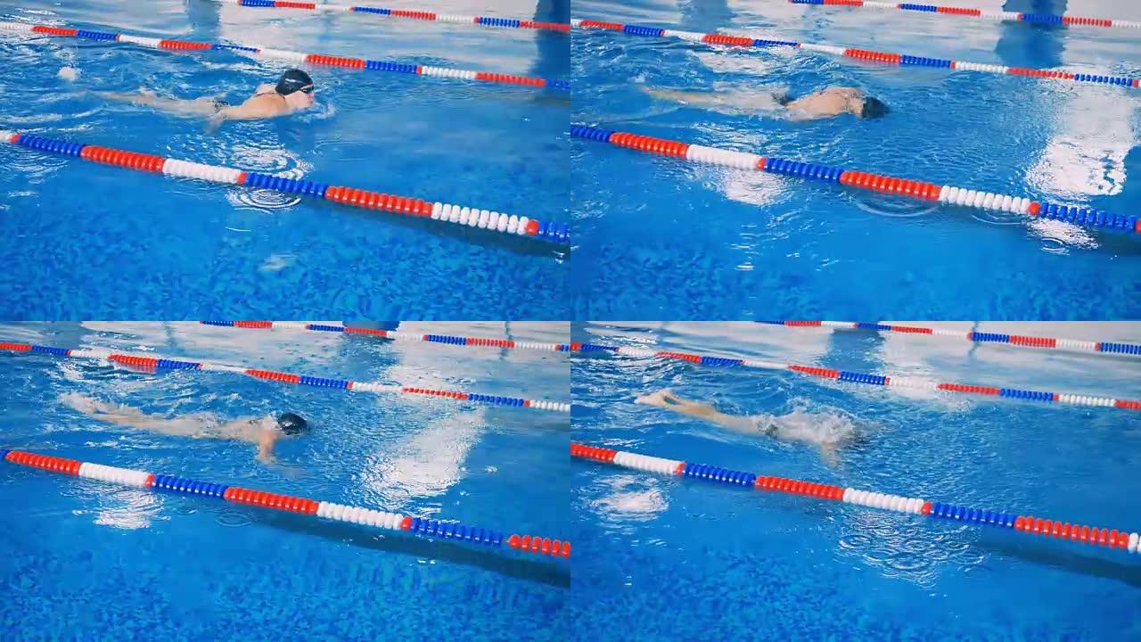 运动员在游泳池里训练。