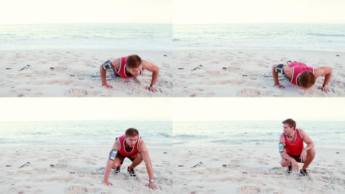 在海滩上做俯卧撑的健康男人