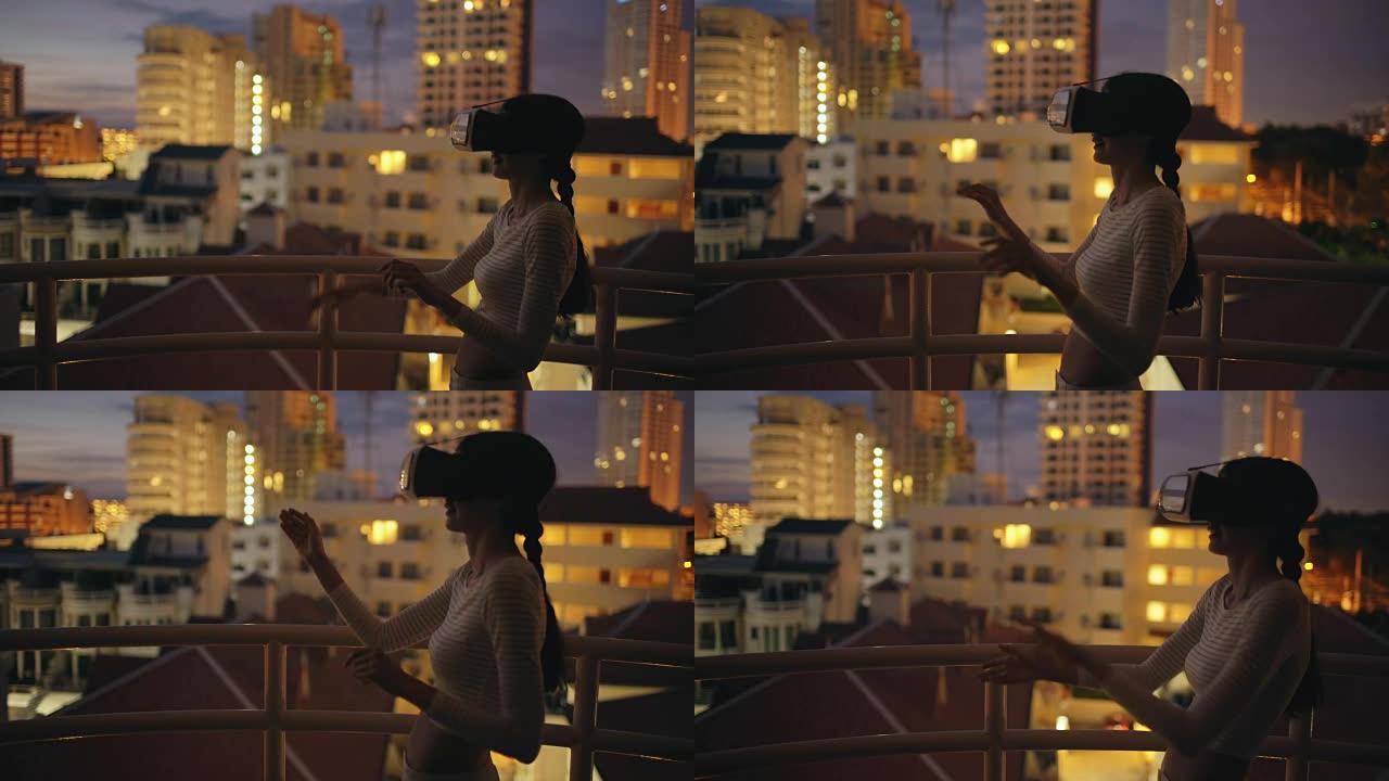 屋顶露台上的年轻女子使用虚拟现实耳机，晚上有虚拟现实体验