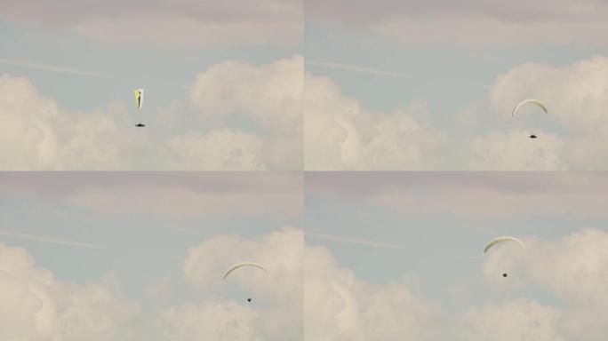 阳光天空中带有降落伞的无人机视点滑翔伞，实时