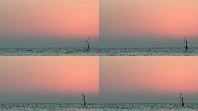 日落时的风帆冲浪日落时的风帆冲浪帆船