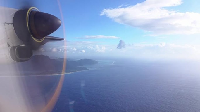 4k特写: 太平洋上空美丽的夏日，螺旋桨飞机在田园诗般的环礁岛上飞行