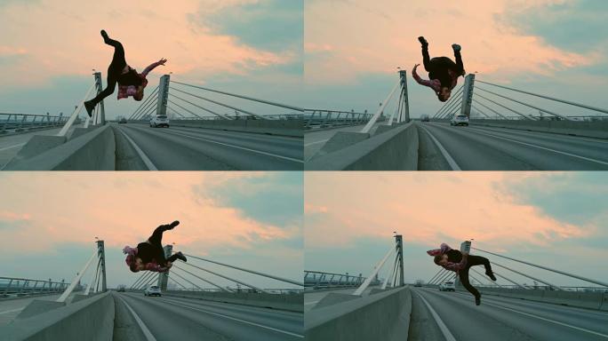 SLO MO B-boy在桥上表演翻筋斗
