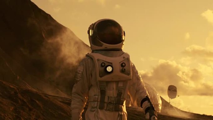 宇航员在火星上进行探索探险。背景:他的基地/研究站。第一次载人火星任务，技术进步带来了太空探索和殖民