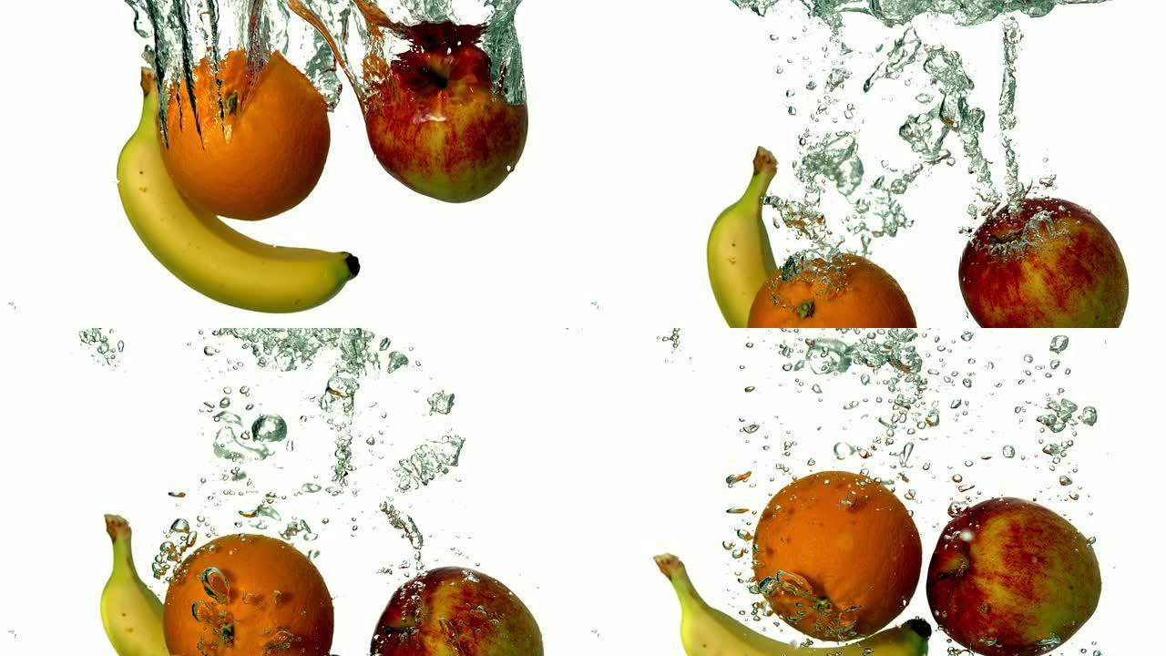 香蕉苹果和橙色在白色背景下陷入水中