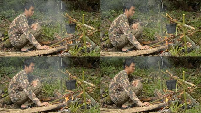 森林人感到悲伤烧火煮食物