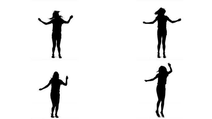 女人剪影在慢动作中跳舞