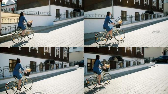 穿着裙子的快乐女孩骑自行车探索城市，慢动作，steadicam拍摄