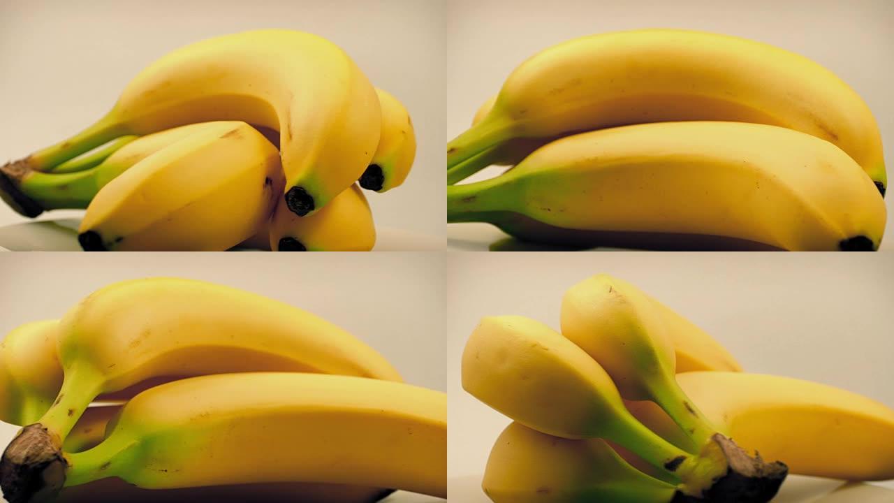 香蕉束在白色上旋转