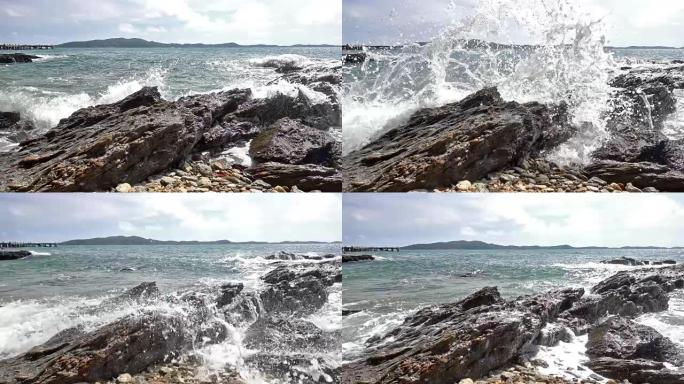 泰国热带海滩海浪撞击岩石海岸线的慢动作