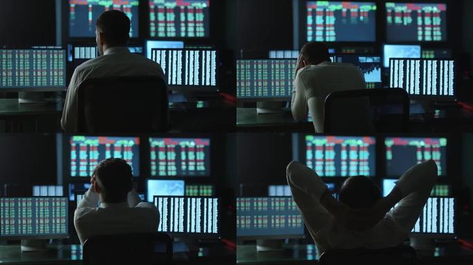 一名穿着白衬衫的股票经纪人正紧张而疲惫地在一间有显示屏的暗室里工作。