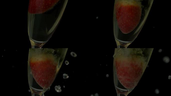 草莓落入香槟长笛