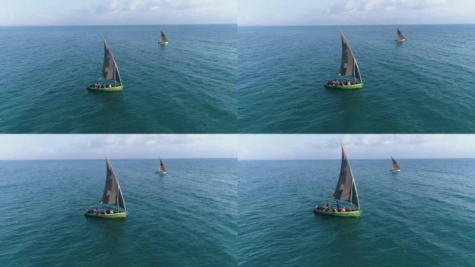 两艘传统单帆船渔船出海捕鱼的空中特写镜头