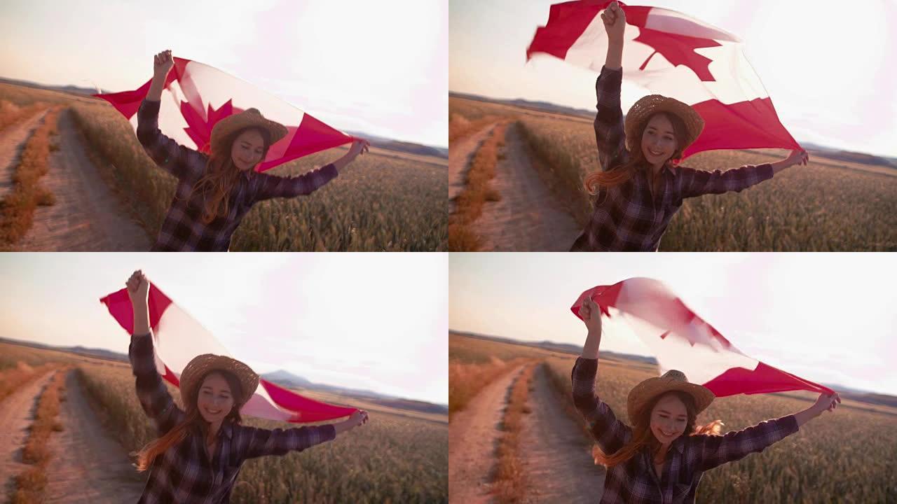 年轻女子在田野中奔跑并挥舞着加拿大国旗