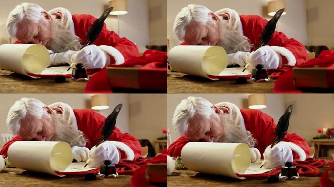 圣诞老人在用羽毛笔写信时睡在桌子上
