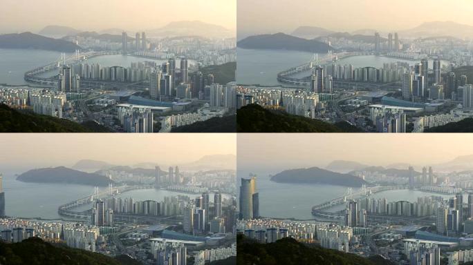 韩国釜山。晨曦中平移市中心的景色。4K