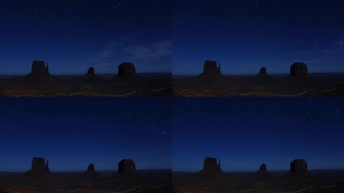 夜间时间流逝: 纪念碑谷梅萨山脉上方的惊人星空