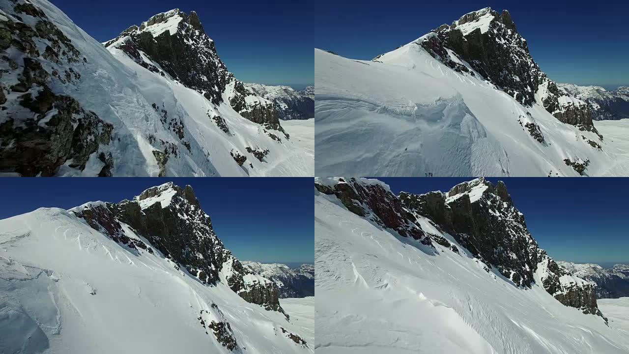 Establishing shot of snowy mountain top landscape 