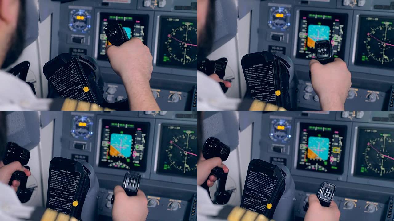 飞行员掌舵，特写。