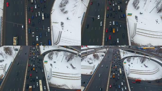 高速公路交汇处。带有摄像机运动的巨大立交桥上的交通俯视图。