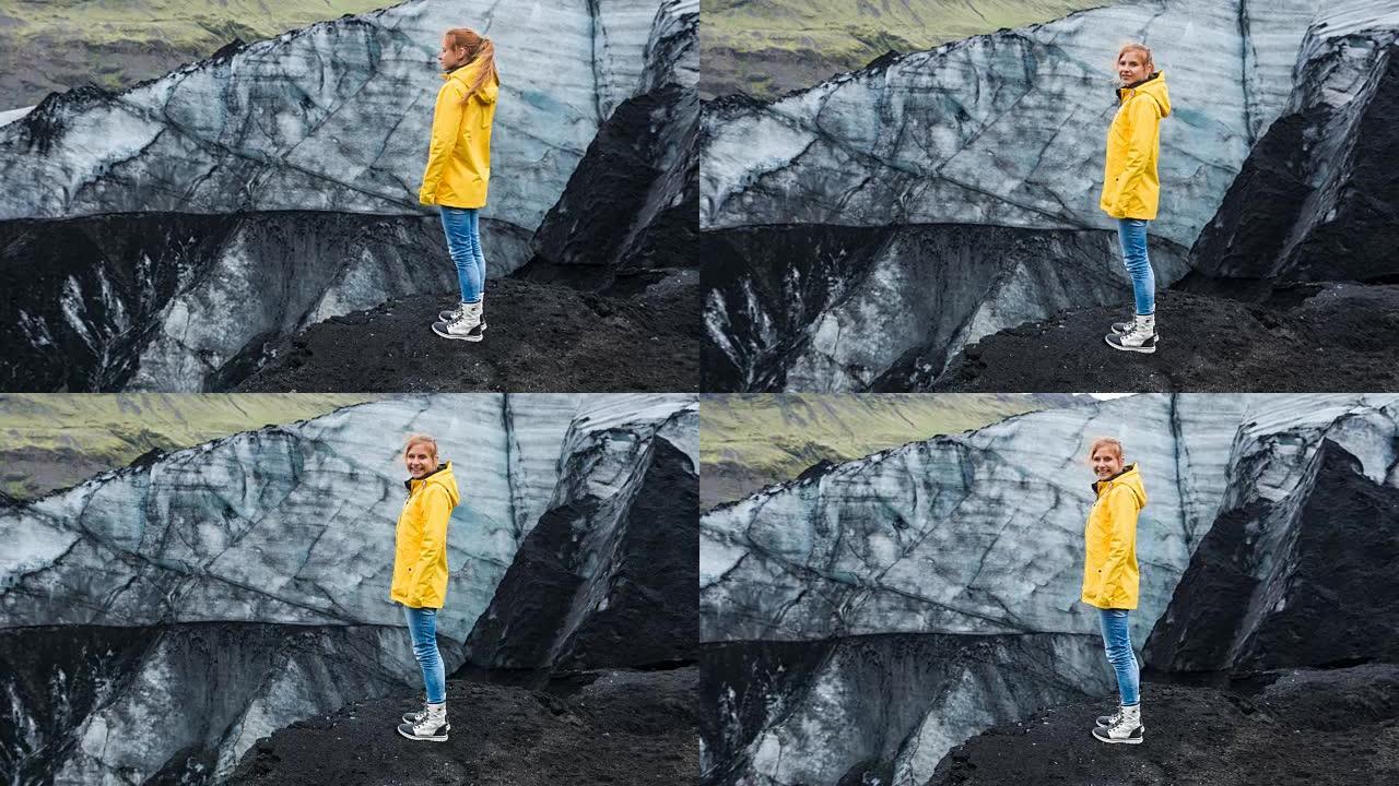 欣赏火山灰覆盖的冰川的女性游客